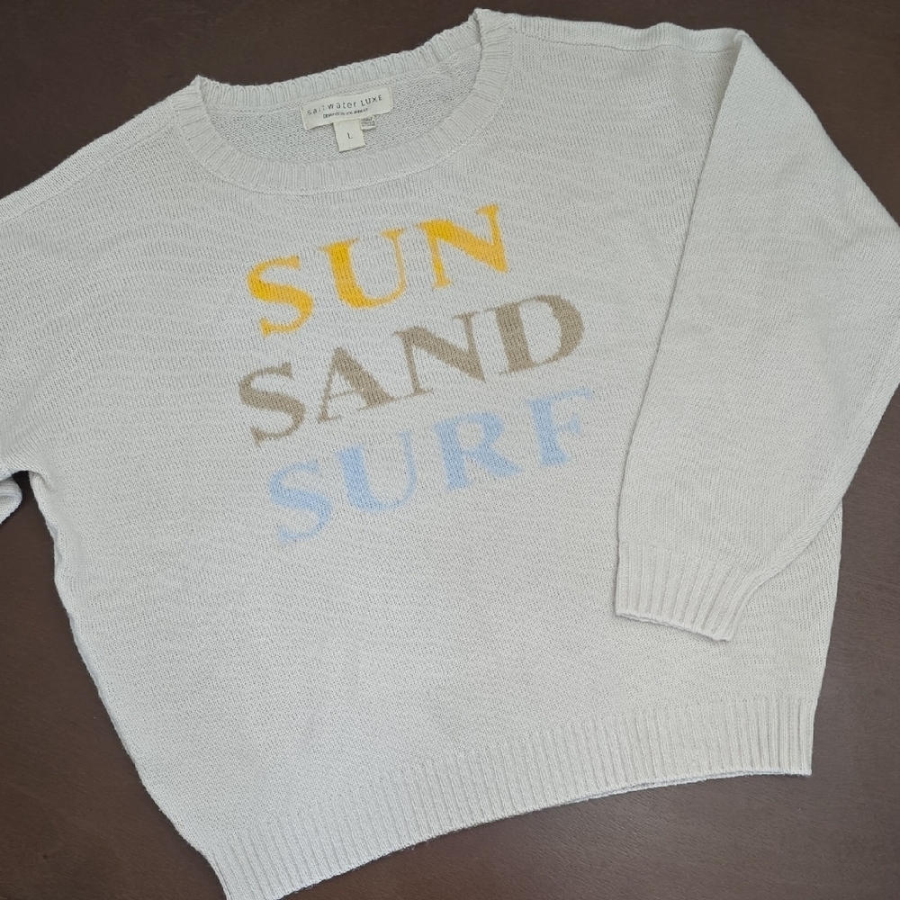 SALTWATER LUXE Crew Neck Sz L Sweater Cream Yellow Tan Blue Text Sun Sand Surf